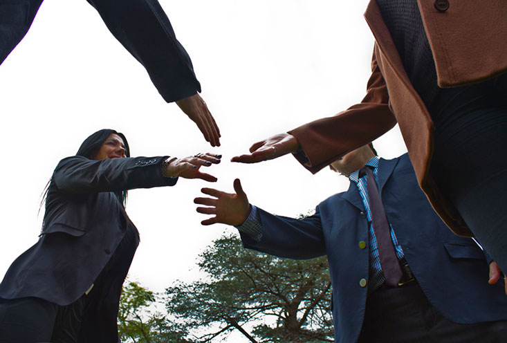 Figure 1 shows businessmen shaking hands according to the context in which it takes place