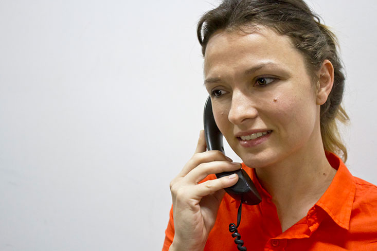 Figure 23 shows a businesswoman on the phone